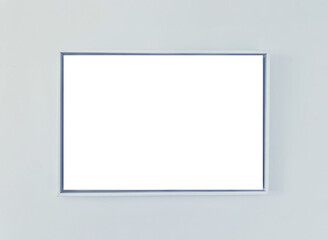 Picture frame in baby blue hanging on the wall