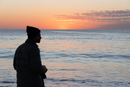 silhouette of a person on the beach, bronte beach sydney at sunrise