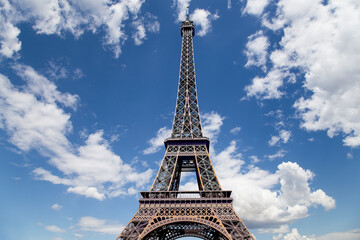 Fototapeta na wymiar Eiffel Tower against the background of a beautiful sky with clouds. Paris, France
