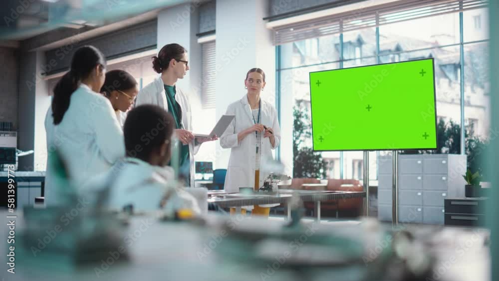 Aufkleber group of students listening to their robotics female professor who uses green screen monitor in a la