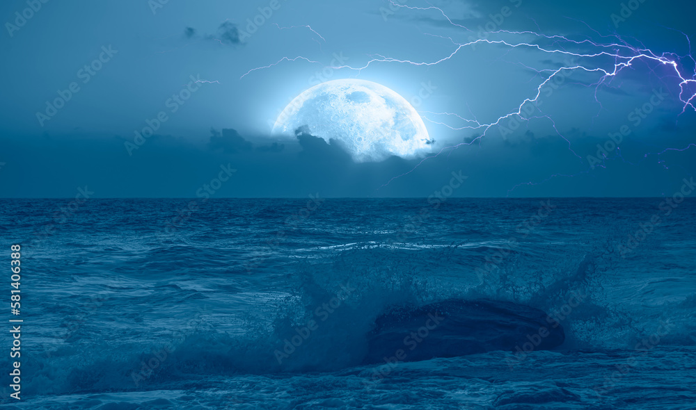 Poster night sky with full moon and lightning in the clouds on the fore ground strong sea wave