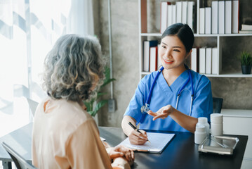 Woman doctor consulting with patient discussing something and Presenting results on report, Medicine and health care concept..