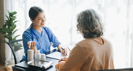 Woman doctor consulting with patient discussing something and Presenting results on report, Medicine and health care concept..