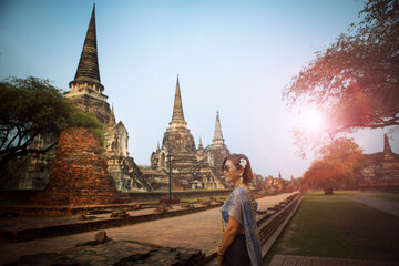 asian woman wearing thai traditional suit standing at old temple one of most popular traveling destination in ayutthaya world heritage site of unesco central of thailand