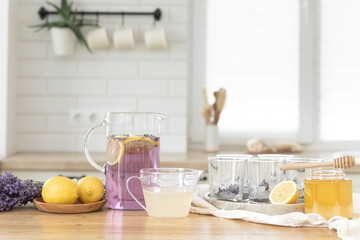 Making a refreshing summer drink. Preparing lemonade in the kitchen. Healthy food concept