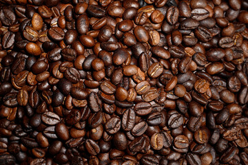 photo macro close up texture of roasted coffee beans dark, can be used as a background..
