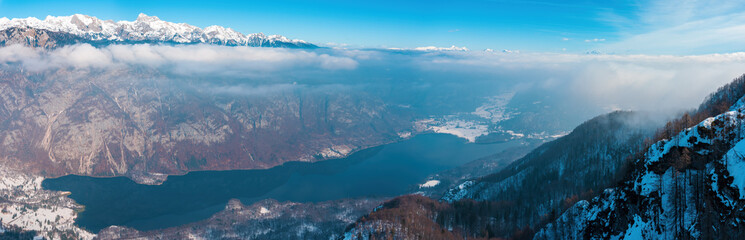 Aerial view of lake Bohinj panorama with Triglav mountain on cold winter morning