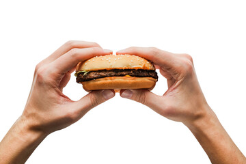 a man holds a burger in his hands on a transparent background close-up top view