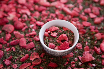 dried tea with mint and strawberries. Texture. dry herbal tea with peppermint, strawberry slices