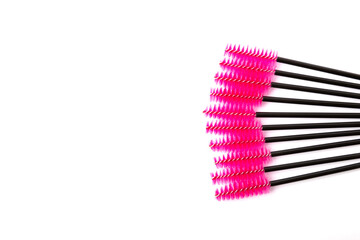 Mascara brushes isolated on white background. Makeup brushes makeup kits.Disposable brush for eyelashes and eyebrows.Close-up.