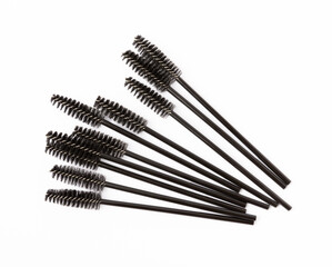 Mascara brushes isolated on white background. Makeup brushes makeup kits.Disposable brush for eyelashes and eyebrows.Close-up.