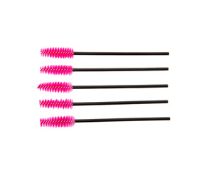 Mascara brushes isolated on white background. Makeup brushes makeup kits.Disposable brush for eyelashes and eyebrows.Close-up.