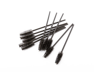 Mascara brushes isolated on white background. Makeup brushes makeup kits.Disposable brush for eyelashes and eyebrows.Close-up.