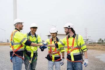 Wind turbine service engineer maintenance and plan for inspection at construction site, renewable electricity generator.