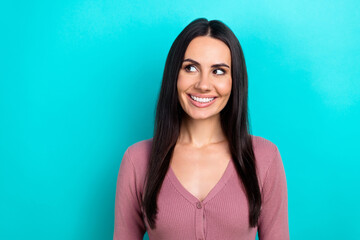 Fototapeta premium Portrait of adorable satisfied woman with long hairstyle wear pastel clothes look empty space isolated on shine turquoise color background