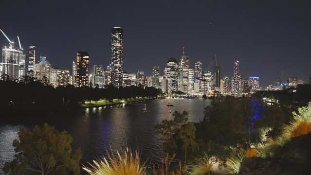 a summer night shot of the city of brisbane and river from kangaroo point in queensland, australia