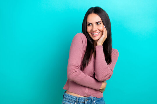 Portrait of positive adorable woman long hairstyle dressed pastel clothes look empty space isolated on shine turquoise color background