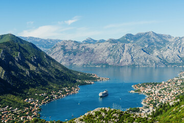 Fototapeta na wymiar Kotor Bay from a height. A famous tourist place. Postcard photo