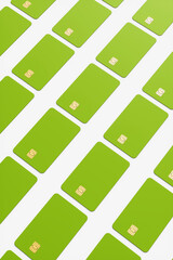 Close-up of a large group of green credit cards on a white background. 3d rendering illustration.