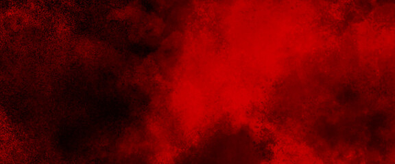 abstract red powder explosion on black background. abstract red powder splatted on black background. Freeze motion of red powder exploding.