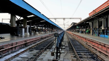 Fototapeta na wymiar Chennai,Tamilnadu,India-December 29 2022:View of railway track in platform of Chennai Central