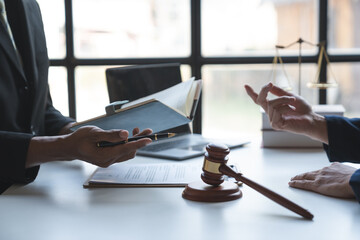 Private office of a young Asian lawyer working on financial information in a private bank. to verify financial accounts and assist clients.