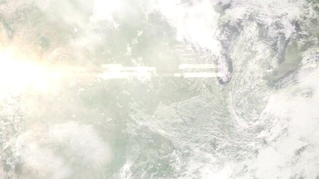 Earth zoom in from outer space to city. Zooming on Pella, Iowa, USA. The animation continues by zoom out through clouds and atmosphere into space. Images from NASA
