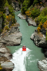 High-speed jet boat ride on Queenstown's Shotover river in Queenstown, New Zealand