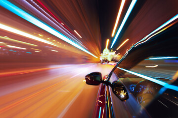 Long exposure of a speedy night drive in a big city