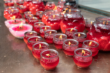 Red candles burning in a buddhist temple, Chengdu, Sichuan province, China - 581473906