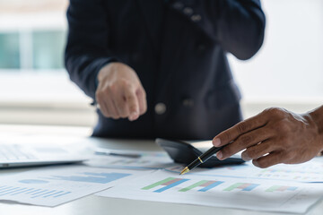 A group of Asian businessmen are brainstorming to analyze financial reporting situations. Calculate...