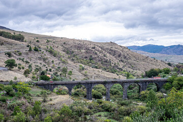 Fototapeta na wymiar View of the valley with viaduct