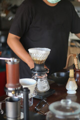 Fototapeta na wymiar barista brewing coffee, pour over coffee