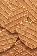 waffles, crunchy cookies snacks in full frame, sweet and delicious wafer food background texture, close-up view taken straight from above