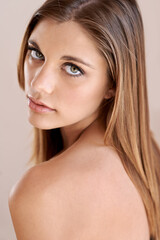 Obraz premium Beguiling beauty. Studio portrait of an attractive model gazing at the camera.