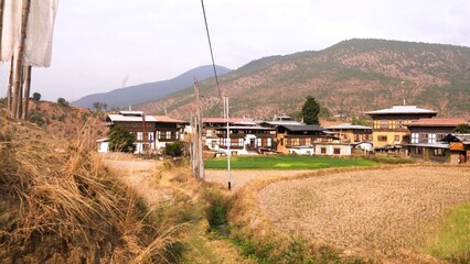 Naklejka premium Agricultural fields of the village in Punakha Valley, Bhutan