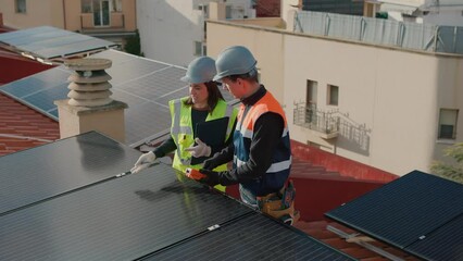 Teamwork and engineers on solar roof for maintenance, inspection or installation