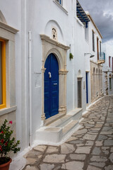 Fototapeta na wymiar Greece. Tinos island. Cycladic architecture in white and blue at Pyrgos village.