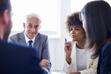 Obraz premium Business discussions. a group of business colleagues meeting in the boardroom.