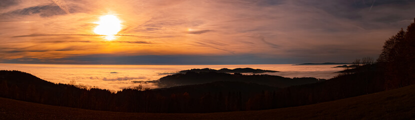 High resolution stitched sunset panorama above the clouds near Kostenz, Bavarian forest, Bavaria, Germany