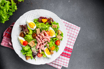 bacon salad, Vosges salad, egg, crouton, lettuce, salad dressing vinaigrette Lorraine cuisine healthy meal food snack on the table copy space food background rustic top view