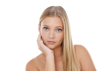 The feeling of soft and smooth skin. A beautiful young blonde woman posing in front of a white background.