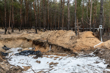 Mass grave site near Izium for civilian victims of war