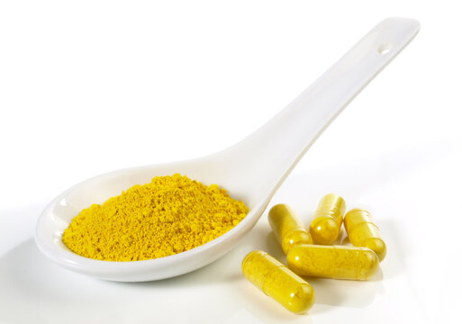 Berberin Powder and Pills isolated on white Background
