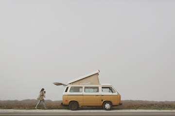 Girl walking back to vintage van © Amanda VanVels