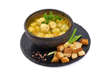 Dietary soup with chicken meatballs, isolated on white background.