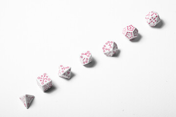 Gaming dices closeup on white background isolated for dungeons, dragons and fantasy roleplaying	