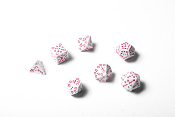 Gaming dices closeup on white background isolated for dungeons, dragons and fantasy roleplaying	