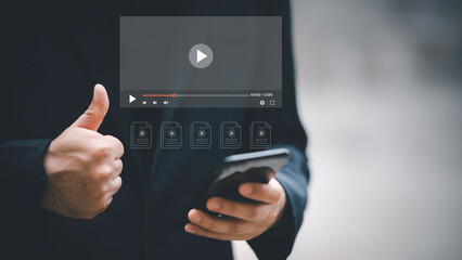 Man using smart phone for streaming online on virtual screen, watching video on internet, live concert, show or tutorial, content online.