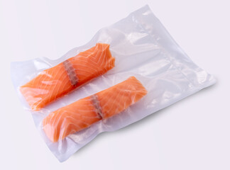 Salmon slices in vacuum packed sealed for sous vide cooking on white background